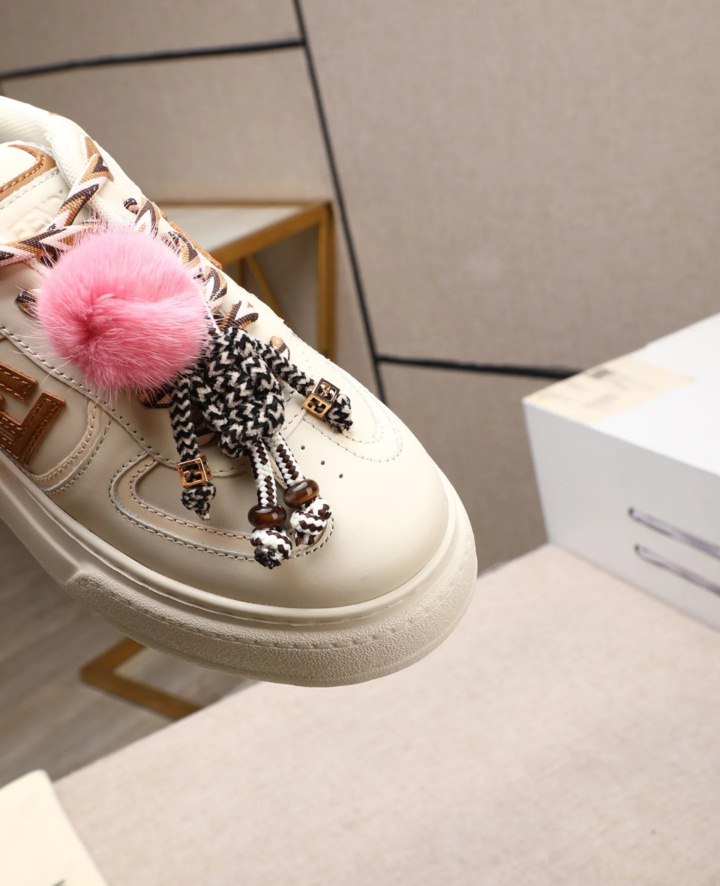 Men's shoes 💰740 Top quality Fendi Match series 25 latest colors Pendant thick sole lace casual FENDI Match lace. Made of light pink leather with white and ocher brown details. Contrast leather FF appliqué on the sides and hiking laces in white, pink and ocher brown. Thick rubber sole with oversized embossed FENDI lettering on the heel. Metal ring charm on the tongue: A small braided doll with contrasting mink fur details and gold metallic FF on the right shoe. The left shoe features a braided cord with contrasting mink double pom poms, metallic FF beads, and Pequin print pattern and logo. Upper: Original custom-made imported first-layer cowhide. Inner lining: Imported custom-made breathable mesh lining. Sole: Original open-molded ultra-light foam material. Bottom thickness: 5CM. Number of yards: women's 35-40 (custom-made 40 non-refundable).